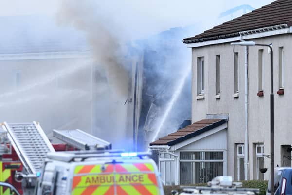 Firefighters tackling the blaze in Broomage Crescent, Larbert