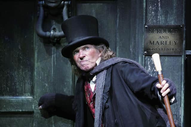 Will the spirit of Ebenezer Scrooge, seen here played by Tommy Steele, be John Swinney's guide when he delivers the Scottish Budget? (Picture: MJ Kim/Getty Images)