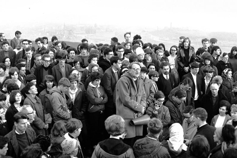 Reverend Dr Selby Wright uses a megaphone to conduct a May Day service on top of Arthur's Seat in 1966.