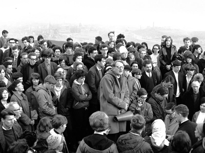 Reverend Dr Selby Wright uses a megaphone to conduct a May Day service on top of Arthur's Seat in 1966.