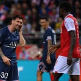 PSG's Argentinian forward Lionel Messi reacts after a challenge from Reims' Zimbabwean midfielder Marshall Munetsi.