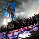 Rangers fans light pyrotechnics during the 4-1 win over Hibs at Easter Road. (Photo by Mark Scates / SNS Group)