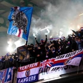 Rangers fans light pyrotechnics during the 4-1 win over Hibs at Easter Road. (Photo by Mark Scates / SNS Group)