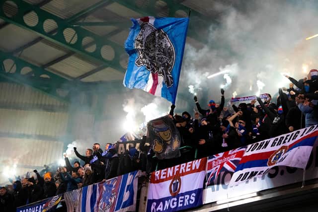 Rangers fans light pyrotechnics during the 4-1 win over Hibs at Easter Road. (Photo by Mark Scates / SNS Group)
