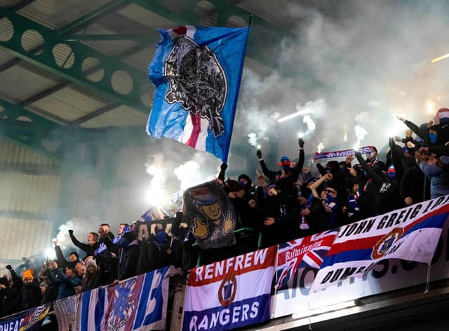 Rangers fans light pyrotechnics during the 4-1 win over Hibs at Easter Road. (Photo by Mark Scates / SNS Group)