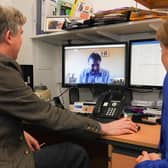 First Minister Nicola Sturgeon being shown the Near Me platform in March 2020.