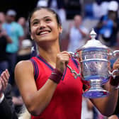 Emma Raducanu celebrates with the US Open trophy following her victory over Leylah Fernandez at Flushing Meadows. (Photo by TIMOTHY A. CLARY/AFP via Getty Images)