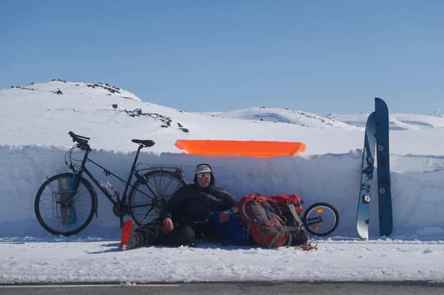 Callum Morris Macintyre on top of the Sognefjellet mountain pass, Norway, with his bike, split snowboard and pulk. For his film Ode to the Glacier, screening at this year's For William Mountain Festival, he travelled some 700km.