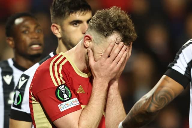 Aberdeen's Nicky Devlin shows his anguish after the gut-wrenching 3-2 defeat by PAOK.