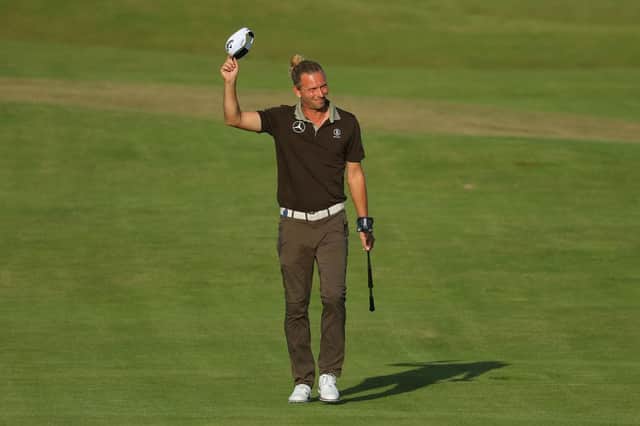 Marcel Siem acknowledges the fans as he makes his way up the 18th hole at Royal St George’s. Picture: Andrew Redington/Getty Images.