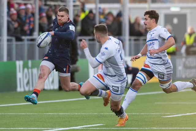 Edinburgh's James Lang kicks ahead, leading to Ben Vellacott's try. (Photo by Mark Scates / SNS Group)