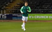 Celtic defender Yuki Kobayashi warms up ahead of taking part in Cammy Kerr's Dundee testimonial match at Dens Park. (Photo by Ross Parker / SNS Group)