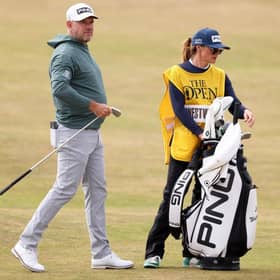 Lee Westwood looks on alongside caddie and wife Helen during the first round of the 150th Open at St Andrews. Picture: Warren Little/Getty Images.