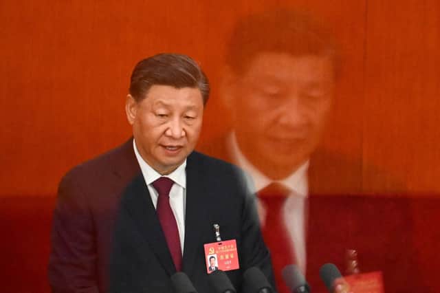 China's President Xi Jinping speaks during the opening session of the 20th Chinese Communist Party's Congress at the Great Hall of the People in Beijing on October 16, 2022. - The effect was achieved through varying the lens' focal length. Picture, Getty