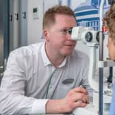 Michael O'Kane, from Specsavers in Morningside and Cameron Toll, is among those volunteering at the special clinics this winter