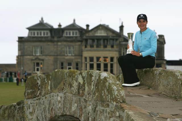 Lorena Ochoa of Mexico poses on the Swilcan Bridge with the trophy following her victory in the 2007 Ricoh Women's British Open held on the Old Course at St Andrews. Picture: Warren Little/Getty Images.