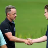 Luke Donald shakes hands with Bob MacIntyre after they played together in the opening two rounds of last year's BMW PGA Championship at Wentworth. Picture: Andrew Redington/Getty Images.