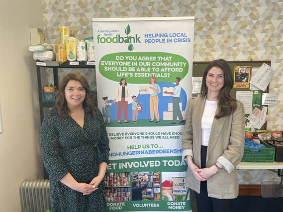Shona Singer from Aberdeenshire North Foodbank with Katie McRobbie from ANM Group.
