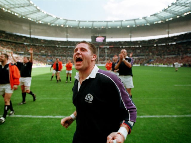 Alan Tait roars in victory after Scotland's famous 36-22 win at the Stade de France in 1999. Tait's two tries, two more from Martin Leslie and one from Gregor Townsend secured the triumph for the Scots, with all five tries coming in a blistering first half. Scotland had already beaten Wales and Ireland and lost narrowly to England. Jim Telfer's side were crowned Five Nations champions the following day when England lost to Wales.