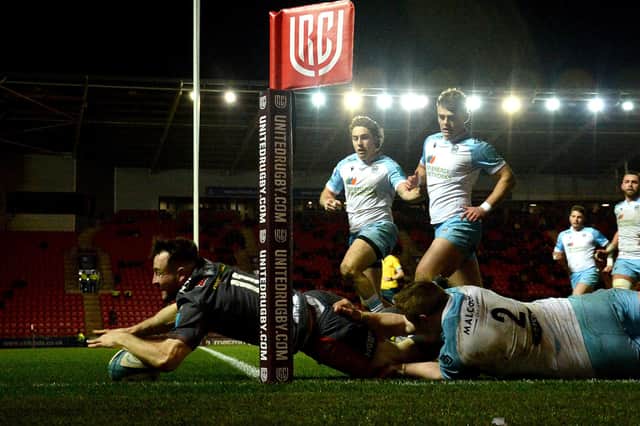 Ryan Conbeer of Scarlets scores a try in the 35-10 win over Glasgow. (Photo: Ben Evans/Huw Evans/Shutterstock -12835296bc)