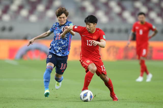 Celtic and Japan forward Kyogo Furuhashi picked up his injury during a challenge with China's Jin Jingdao.