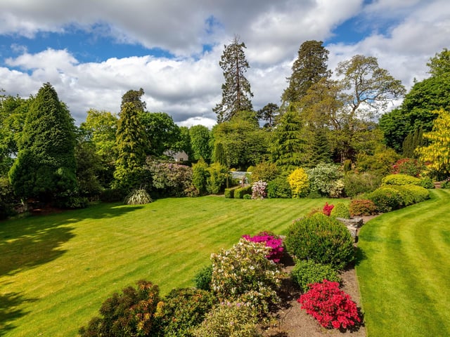 Exterior: The superb gardens include lawns, mature shrubs, large trees, garage, greenhouse and garden store.
Contact: Savills