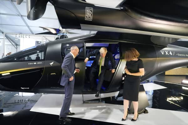 Boris Johnson emerges from a VX4 vertical aerospace aircraft at the Farnborough International Airshow last month (Picture: Frank Augstein/WPA Pool/Getty Images)