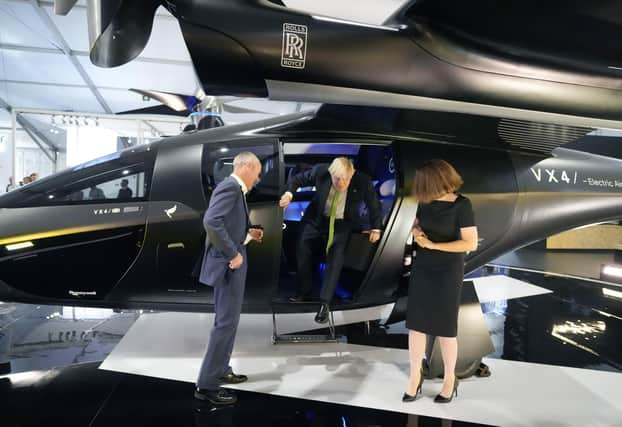 Boris Johnson emerges from a VX4 vertical aerospace aircraft at the Farnborough International Airshow last month (Picture: Frank Augstein/WPA Pool/Getty Images)