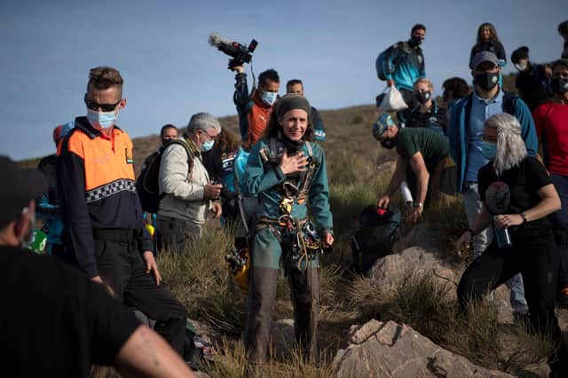 Spanish sportswoman Beatriz Flamini emerges from a cave in Los Gauchos, near Motril in the south of Spain on Friday after spending 500 days inside. (Photo by JORGE GUERRERO / AFP) (Photo by JORGE GUERRERO/AFP via Getty Images)