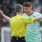 Hibs striker Kevin Nisbet argues with referee Craig Napier during the 1-1 draw at St Johnstone.