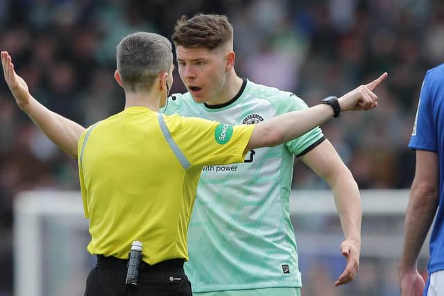 Hibs striker Kevin Nisbet argues with referee Craig Napier during the 1-1 draw at St Johnstone.