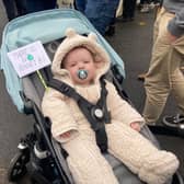 7-month-old Remy from the East End of Glasgow held up a small placard in his pram, stating ‘there is no planet B’ as he wore a teddy-bear onesie.