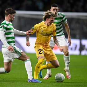GLASGOW, SCOTLAND - FEBRUARY 17: Celtic's Matt O'Riley and  Tom Rogic can't prevent Bodo/Glimt's Runar Espejord moving forward with the ball in the 3-1 home first leg defeat for Ange Postecoglou's side to the Norwegians, but the Londoner maintains it is wrong to read into the European exit that the  playmaking duo are too attack-minded to be paired. (Photo by Rob Casey / SNS Group)
