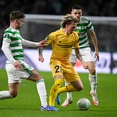 GLASGOW, SCOTLAND - FEBRUARY 17: Celtic's Matt O'Riley and  Tom Rogic can't prevent Bodo/Glimt's Runar Espejord moving forward with the ball in the 3-1 home first leg defeat for Ange Postecoglou's side to the Norwegians, but the Londoner maintains it is wrong to read into the European exit that the  playmaking duo are too attack-minded to be paired. (Photo by Rob Casey / SNS Group)