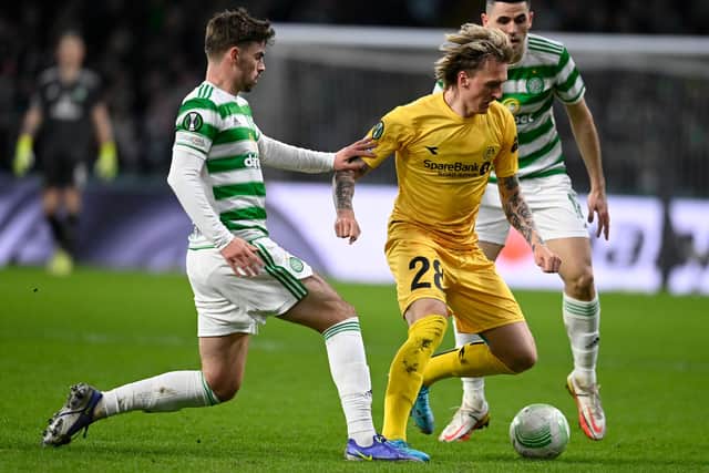 GLASGOW, SCOTLAND - FEBRUARY 17: Celtic's Matt O'Riley and  Tom Rogic can't prevent Bodo/Glimt's Runar Espejord moving forward with the ball in the 3-1 home first leg defeat for Ange Postecoglou's side to the Norwegians, but the Londoner maintains it is wrong to read into the European exit that the  playmaking duo are too attack-minded to be paired. (Photo by Rob Casey / SNS Group)