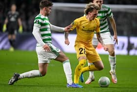 GLASGOW, SCOTLAND - FEBRUARY 17: Celtic's Matt O'Riley and  Tom Rogic can't prevent Bodo/Glimt's Runar Espejord moving forward with the ball in the 3-1 home first leg defeat for Ange Postecoglou's side to the Norwegians, but the Londoner maintains it is wrong to read into the European exit that the  playmaking duo are too attack-minded to be paired. (Photo by Rob Casey / SNS Group)