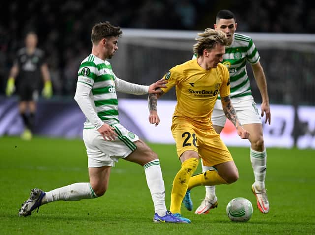 GLASGOW, SCOTLAND - FEBRUARY 17: Celtic's Matt O'Riley and Tom Rogic can't prevent Bodo/Glimt's Runar Espejord moving forward with the ball in the 3-1 home first leg defeat for Ange Postecoglou's side to the Norwegians, but the Londoner maintains it is wrong to read into the European exit that the playmaking duo are too attack-minded to be paired. (Photo by Rob Casey / SNS Group)