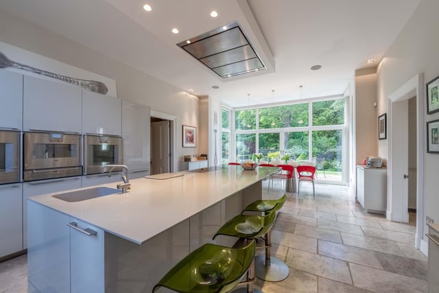At the heart of the home is a showstopping kitchen and utility suite.