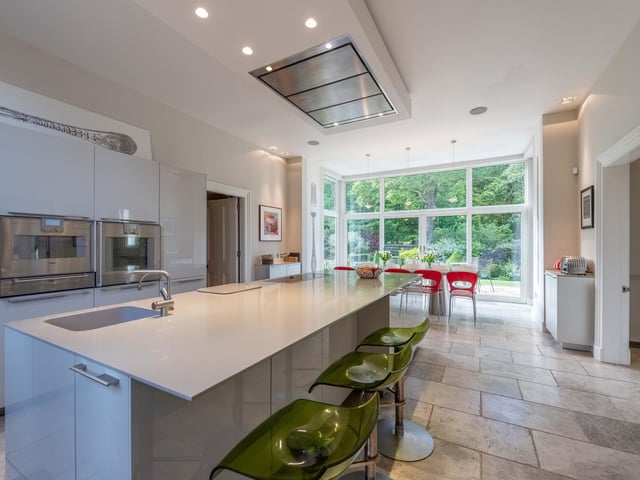 At the heart of the home is a showstopping kitchen and utility suite.