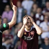 Hearts midfielder Peter Haring looks shocked as he is sent off by referee David Dickinson during the 2-2 draw at St Mirren. (Photo by Alan Harvey / SNS Group)