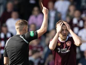Hearts midfielder Peter Haring looks shocked as he is sent off by referee David Dickinson during the 2-2 draw at St Mirren. (Photo by Alan Harvey / SNS Group)