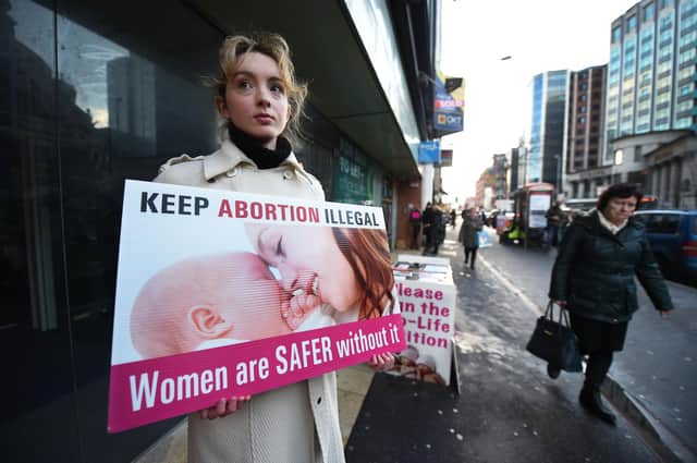 A pro-life activist protests outside the Marie Stopes Clinic in Belfast (Picture: Charles McQuillan/Getty Images)