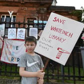 Maureen Cannell with grandchildren, Mallory and Mathew Gallacher outside Whiteinch Library, Glasgow. Picture: John Devlin