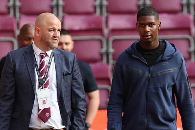 Hearts' sporting director Joe Savage and Odel Offiah at Tynecastle on Thursday night.