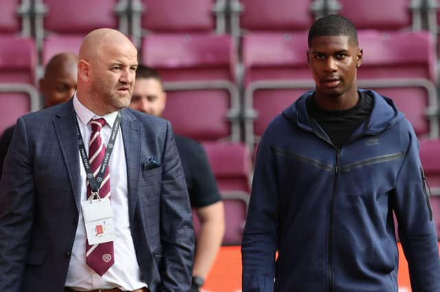 Hearts' sporting director Joe Savage and Odel Offiah at Tynecastle on Thursday night.