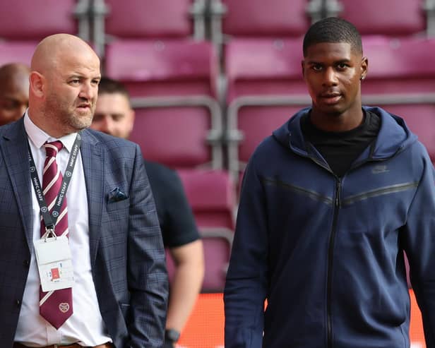 Hearts' sporting director Joe Savage and Odel Offiah at Tynecastle on Thursday night.