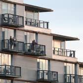 Residents applaud from their block of flats in Glasgow as they to salute local heroes during Thursday's nationwide Clap for Carers initiative to recognise and support NHS workers and carers fighting the coronavirus pandemic.