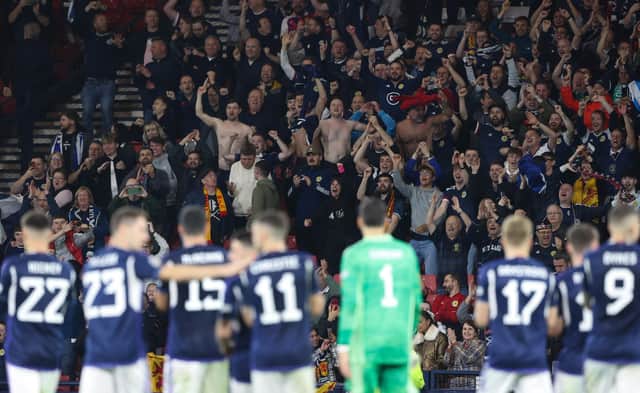 Scotland players and fans celebrate after Saturday's win over Ireland at Hampden.  (Photo by Craig Williamson / SNS Group)