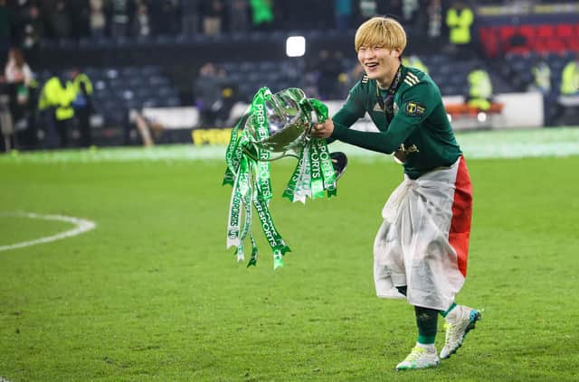 Celtic’s Kyogo Furuhashi celebrates with the Premier Sports Cup.
