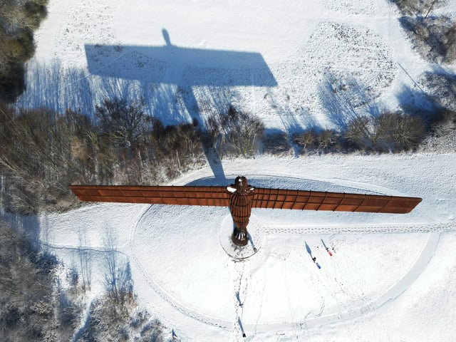 Antony Gormley's Angel of the North sculpture in the snow, at Gateshead, Tyne and Wear.